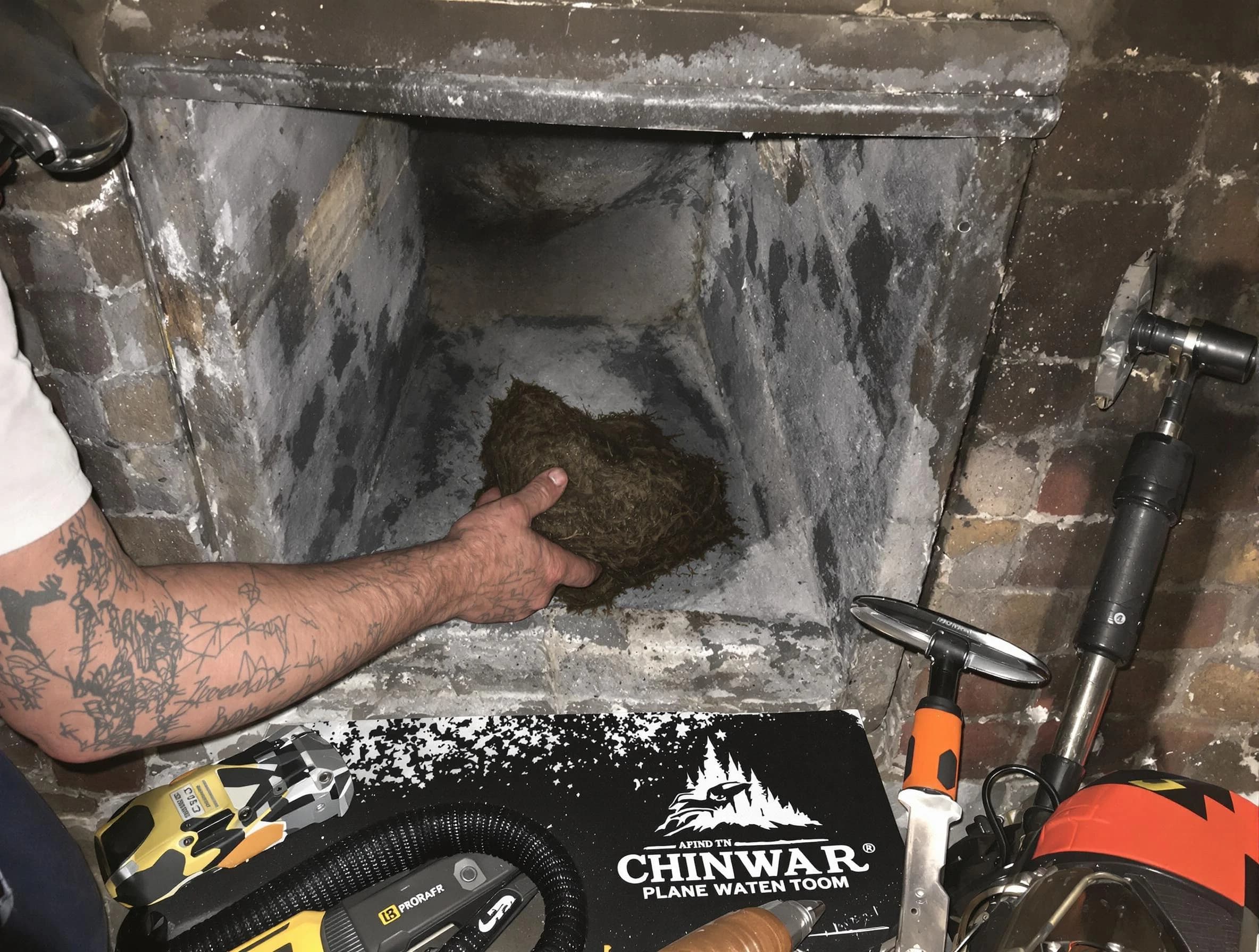 Baldwin Chimney Sweep safely removing debris and screening chimney in Baldwin, PA